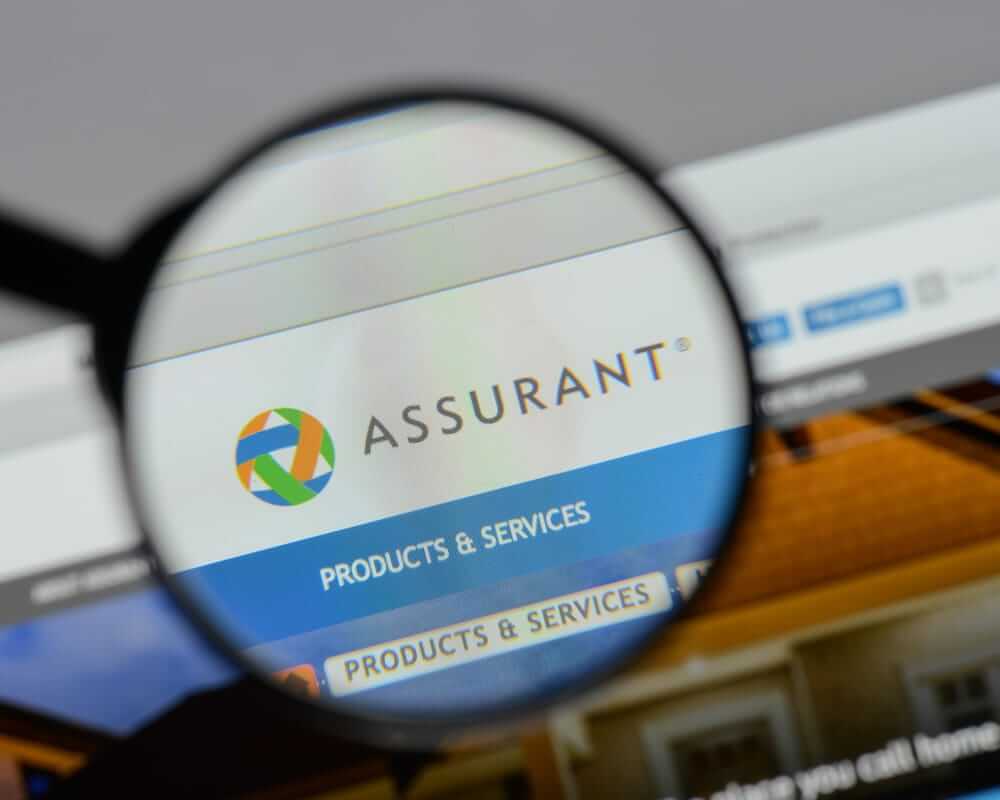 Assurant Inc magnified logo- by Casimiro PT via Shutterstock
